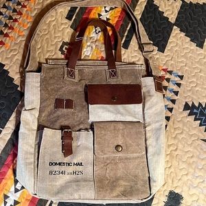 Canvas/leather tote messenger bag.
